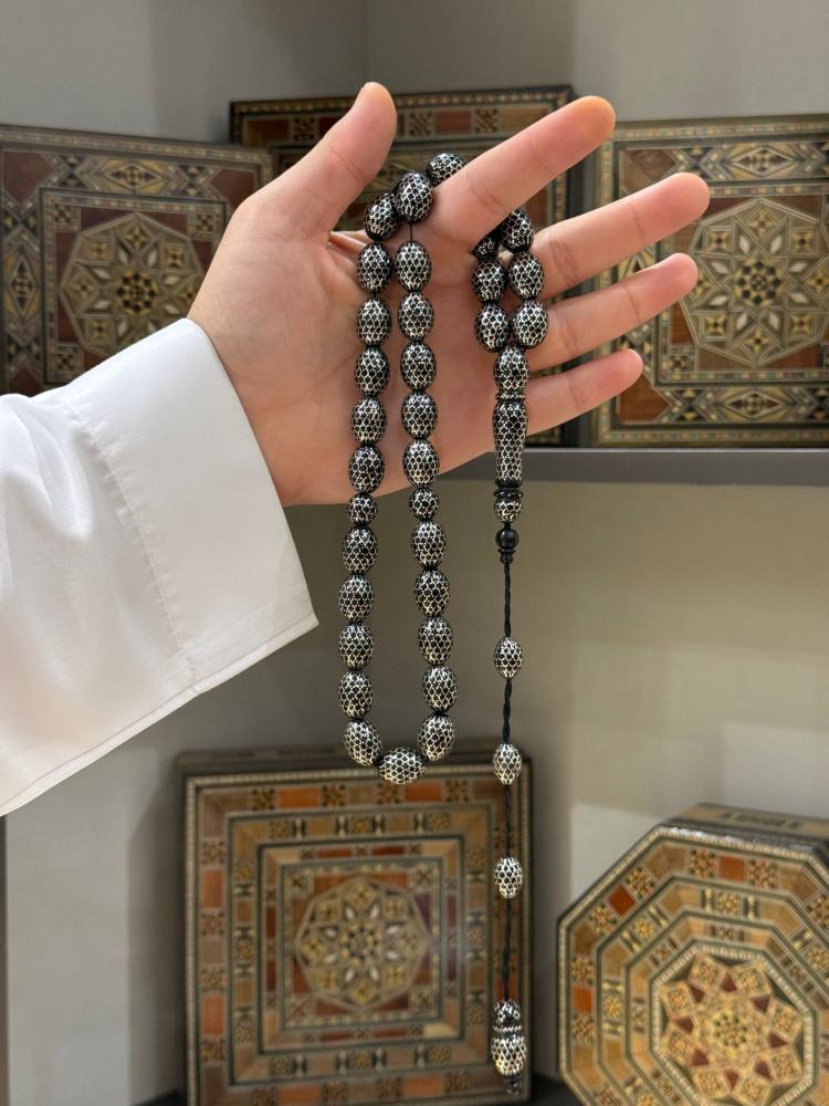 مسابيح يسر طبيعي تطعيم فضة محمود طرزان - حجر السلطان ولك من الاسم نصيب