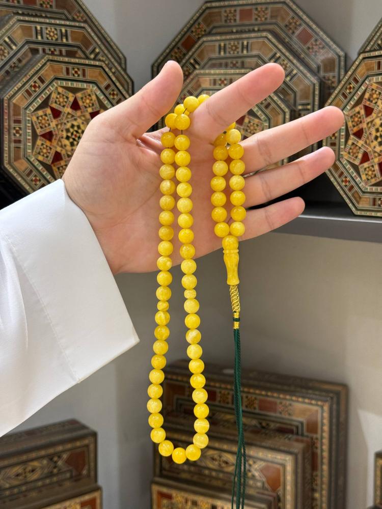 مسابيح كهرمان طبيعي كلنغرادي كروي - حجر السلطان ولك من الاسم نصيب