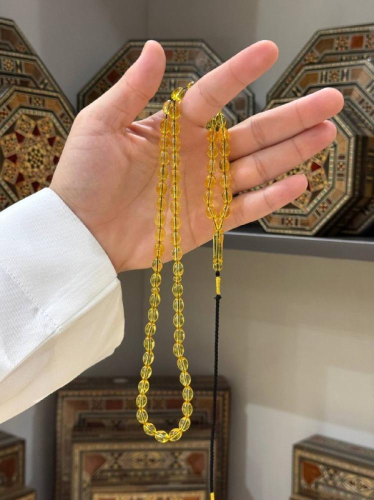 مسبحة كهرب طبيعي شفاف بيض حمام - حجر السلطان ولك من الاسم نصيب