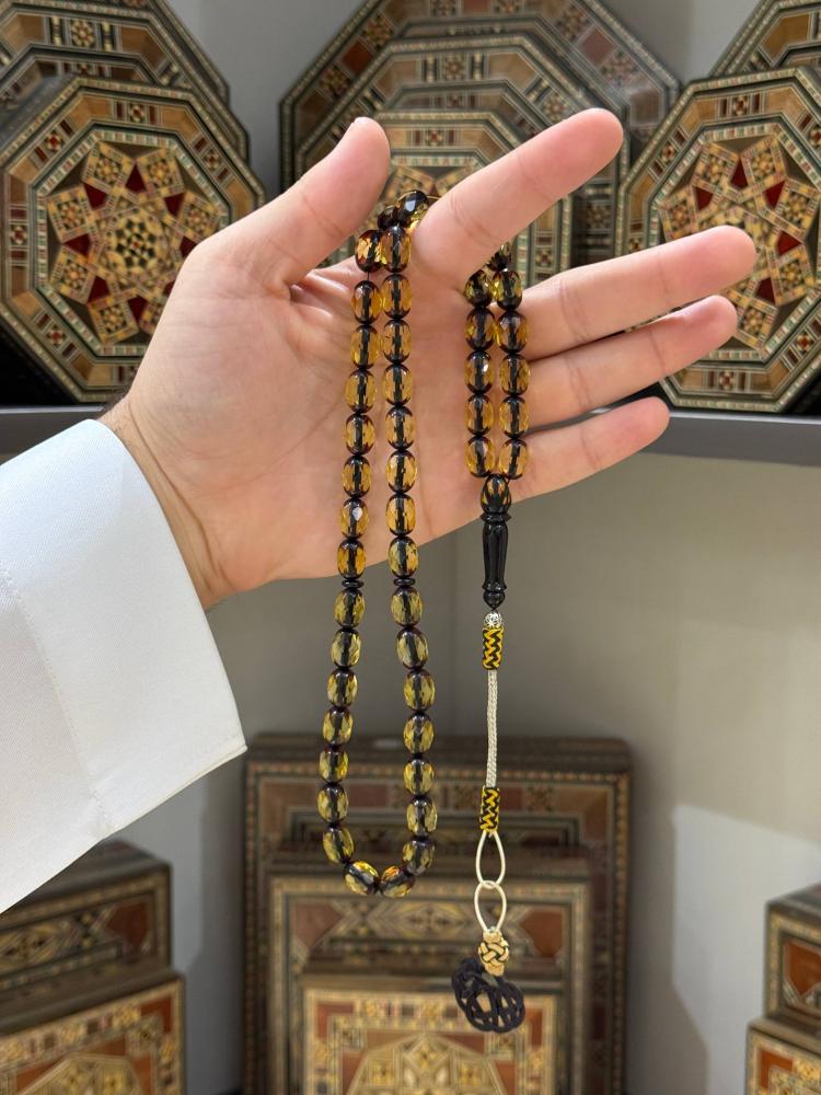 مسبحة كهرمان طبيعي تراش بيض حمام - حجر السلطان ولك من الاسم نصيب