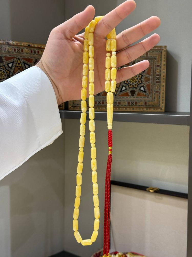 مسابيح كهرم طبيعي كبسولي - حجر السلطان ولك من الاسم نصيب