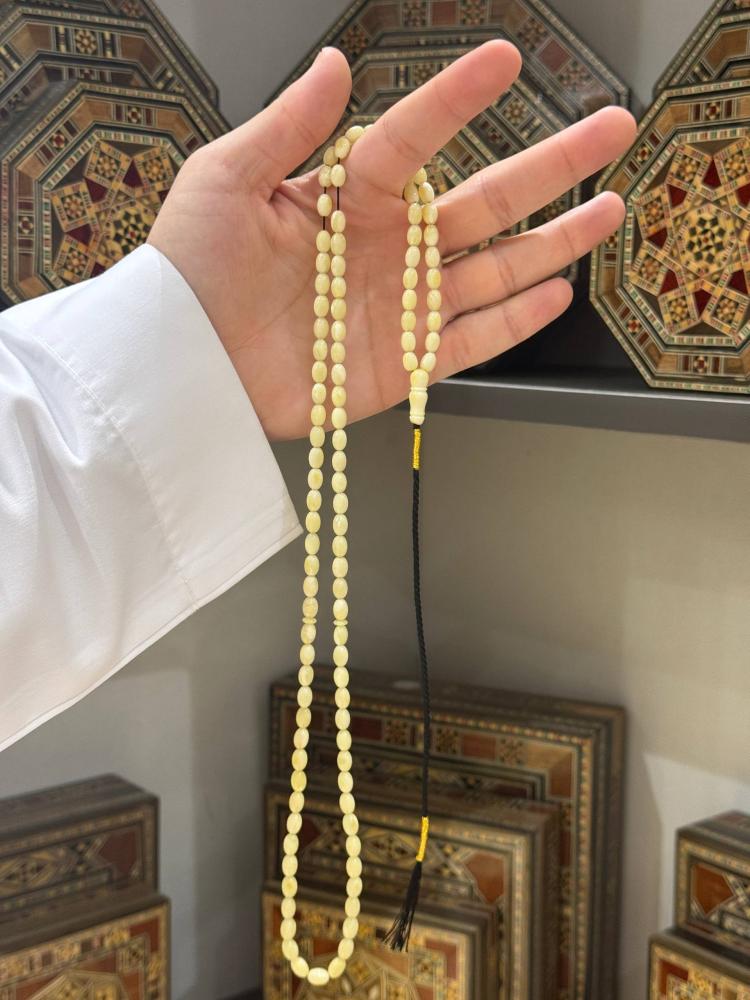 سبحة كهرمان طبيعي اوكراني بيض حمام - حجر السلطان ولك من الاسم نصيب
