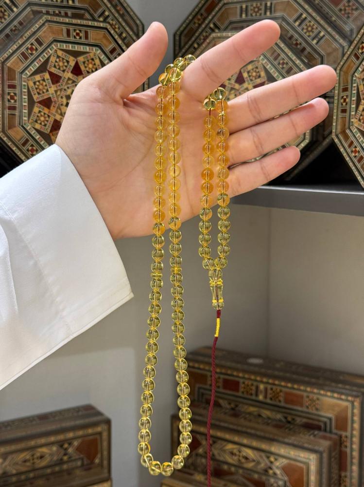 مسبحة كهرمان طبيعي شفاف سوبر كروي - حجر السلطان ولك من الاسم نصيب