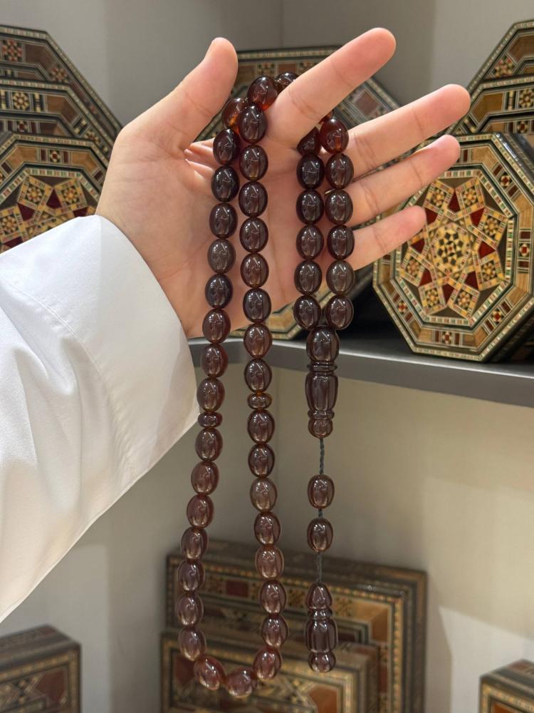 مسابيح كهرمان طبيعي سومطري بيض حمام - حجر السلطان ولك من الاسم نصيب