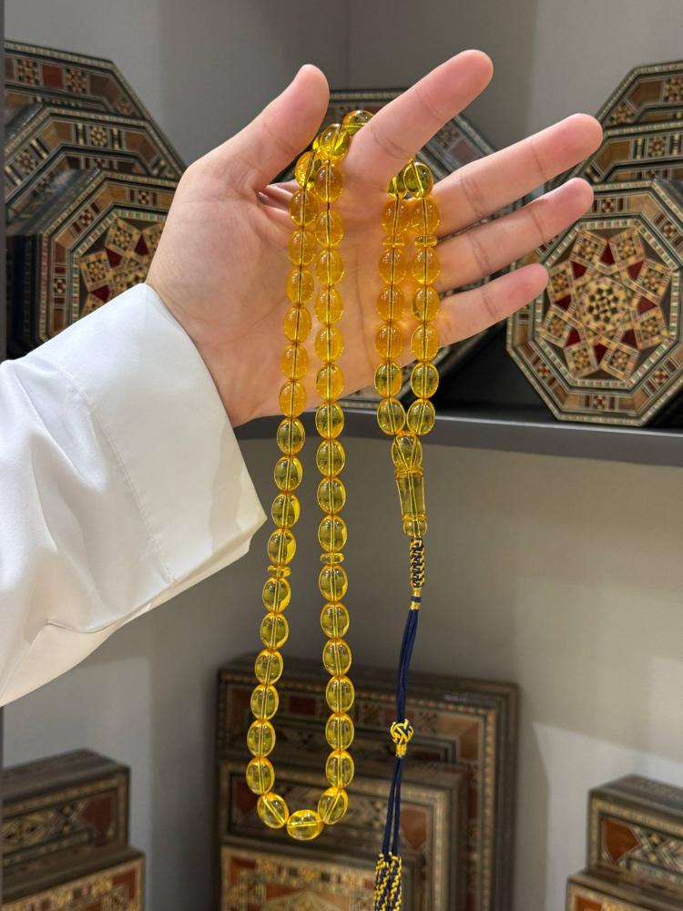 مسابيح كهرب طبيعي شفاف بيض حمام - حجر السلطان ولك من الاسم نصيب