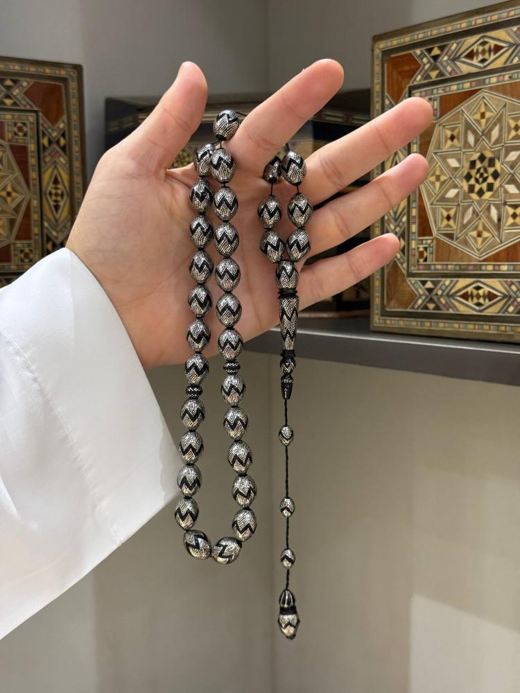 مسبحة كوك طبيعي تطعيم فضة وليد كلابيزو - حجر السلطان ولك من الاسم نصيب