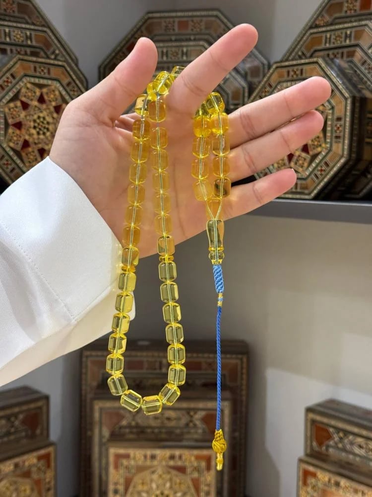 مسبحة كهرمان طبيعي شفاف صندوقي - حجر السلطان ولك من الاسم نصيب