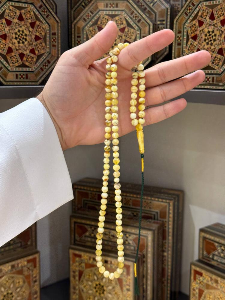 مسبحة كهرب طبيعي شوائب كروي - حجر السلطان ولك من الاسم نصيب