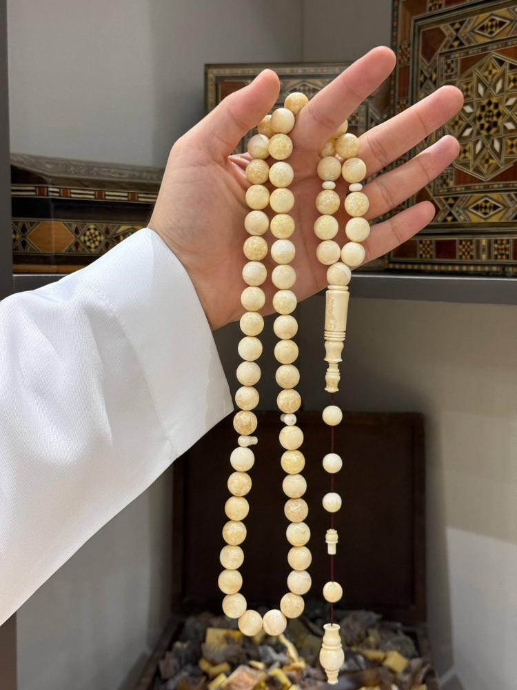 مسبحة عاج فقمة الفظ طبيعي كروي - حجر السلطان ولك من الاسم نصيب
