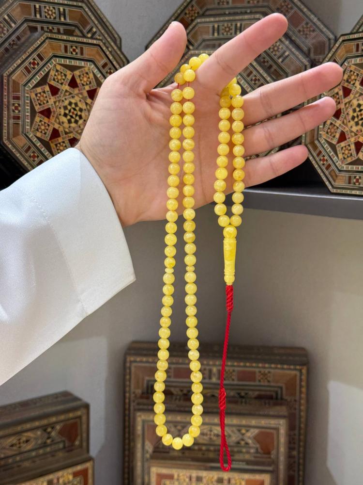 سبح كهرم طبيعي بلطيقي كروي - حجر السلطان ولك من الاسم نصيب