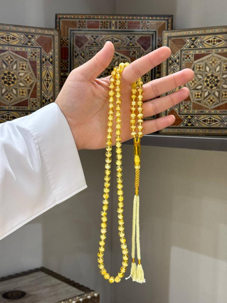 سبح كهرب طبيعي شفاف تخريم وردة كروي - حجر السلطان ولك من الاسم نصيب