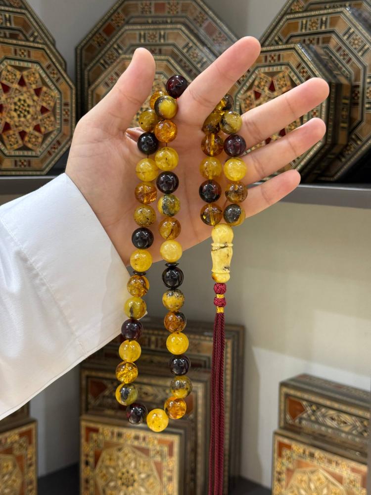 مسباح كهرمان طبيعي ماكنتوش كروي - حجر السلطان ولك من الاسم نصيب