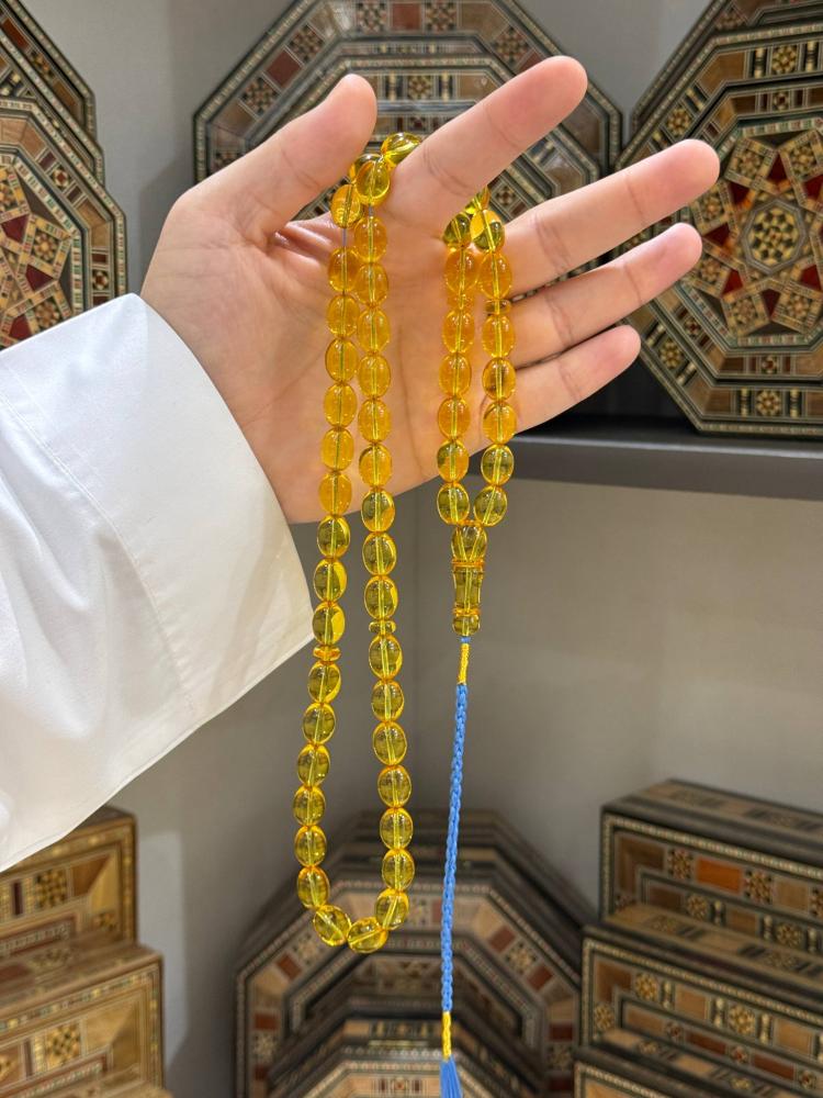 سبح كهرمان طبيعي شفاف بيض حمام - حجر السلطان ولك من الاسم نصيب