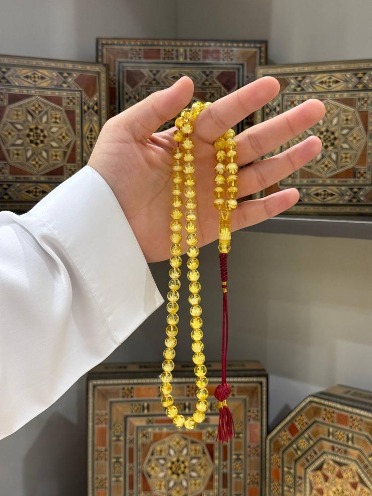مسابيح كهرمان طبيعي وردة كروي - حجر السلطان ولك من الاسم نصيب