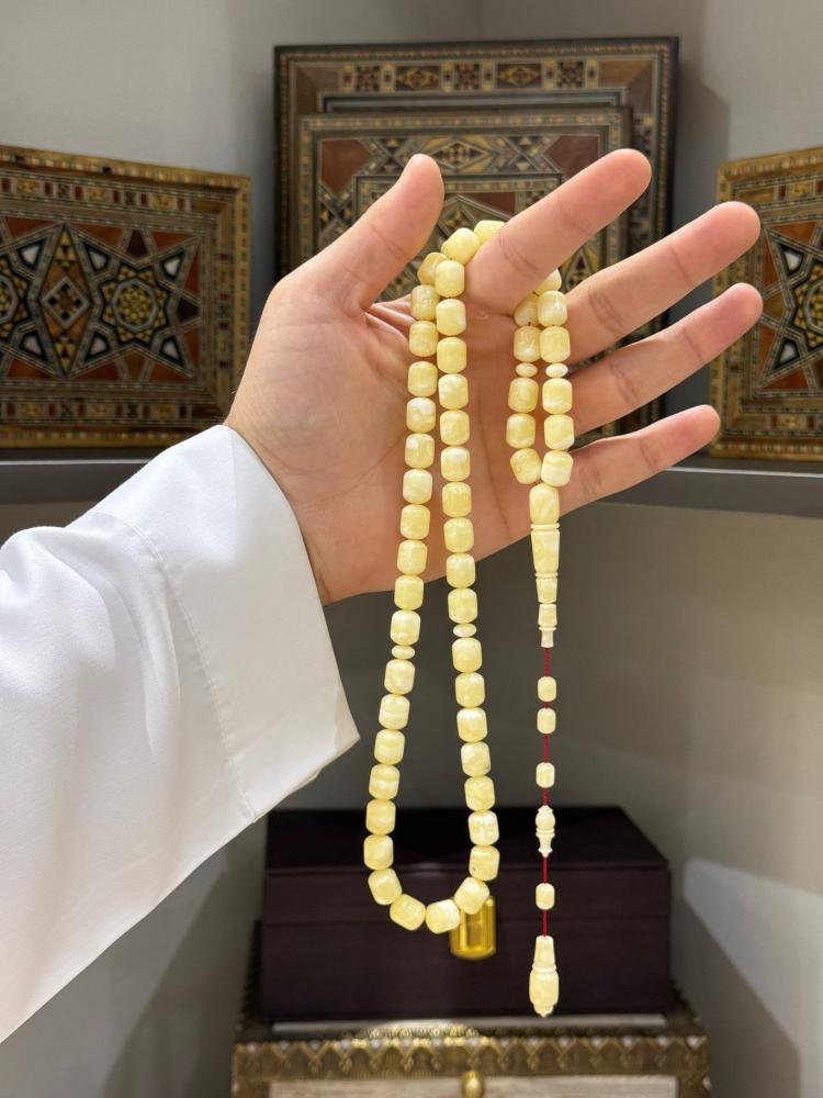 سبح كهرمان طبيعي حجر واحد برميلي - حجر السلطان ولك من الاسم نصيب