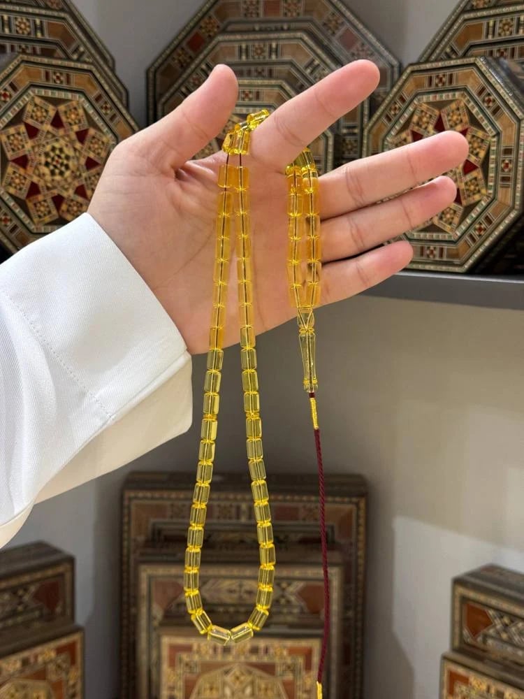 مسباح كهرمان طبيعي شفاف برميلي - حجر السلطان ولك من الاسم نصيب