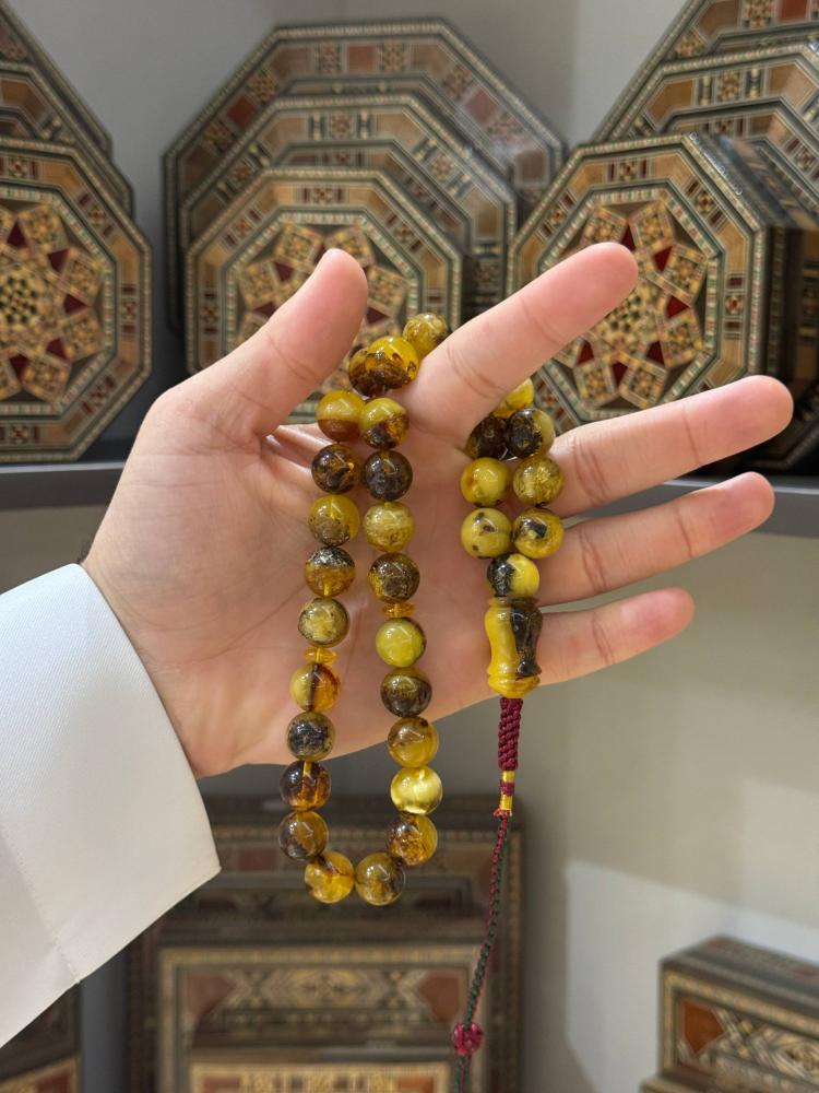 مسابيح كهرب طبيعي شوائبي كروي - حجر السلطان ولك من الاسم نصيب