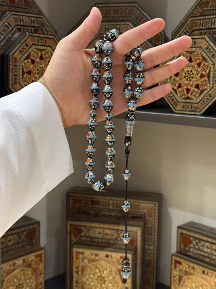 سبحة يسر طبيعي تطعيم فيروز بيض حمام - حجر السلطان ولك من الاسم نصيب