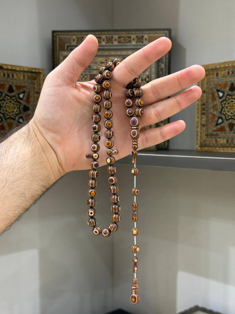 مسباح خشب الكافور كروي- حجر السلطان ولك من الاسم نصيب