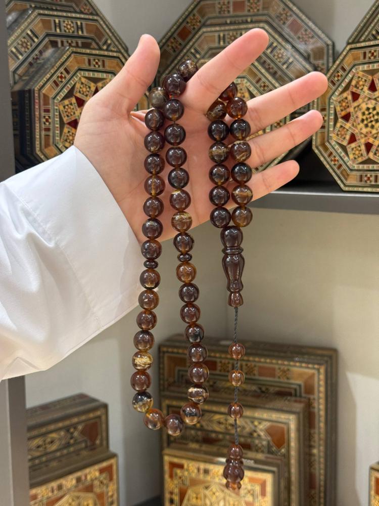مسابيح كهرمان طبيعي سومطري كروي - حجر السلطان ولك من الاسم نصيب
