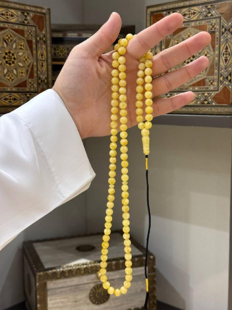 سبحة كهرم طبيعي بلطيقي كروي - حجر السلطان ولك من الاسم نصيب