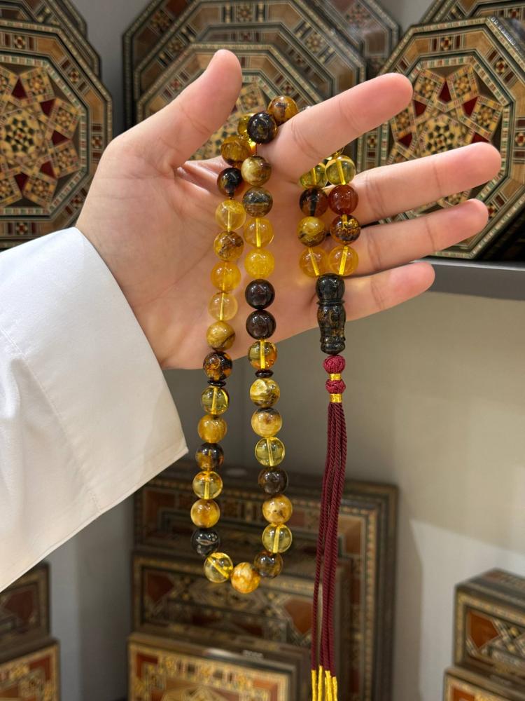 مسبحة كهرب طبيعي ماكنتوش كروي - حجر السلطان ولك من الاسم نصيب