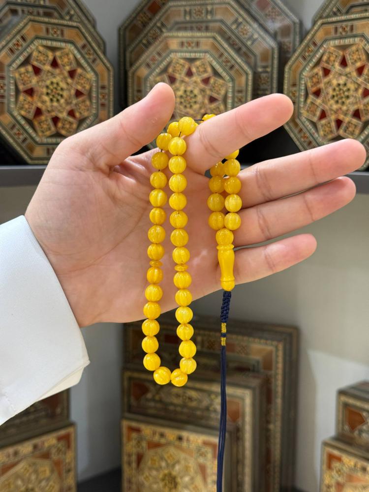 سبح كهرم طبيعي كلنغرادي كروي محزز - حجر السلطان ولك من الاسم نصيب
