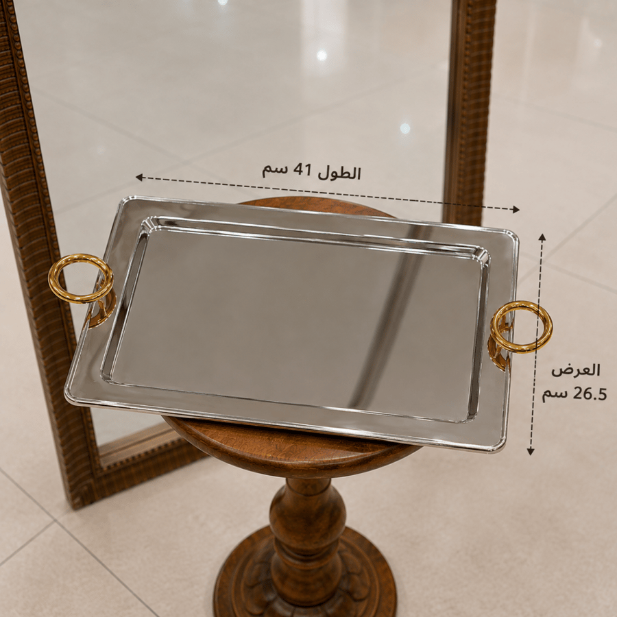 تبسي تقديم بأطراف ذهبي