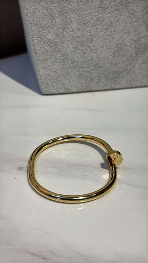 سوارة مسمار ذهبي