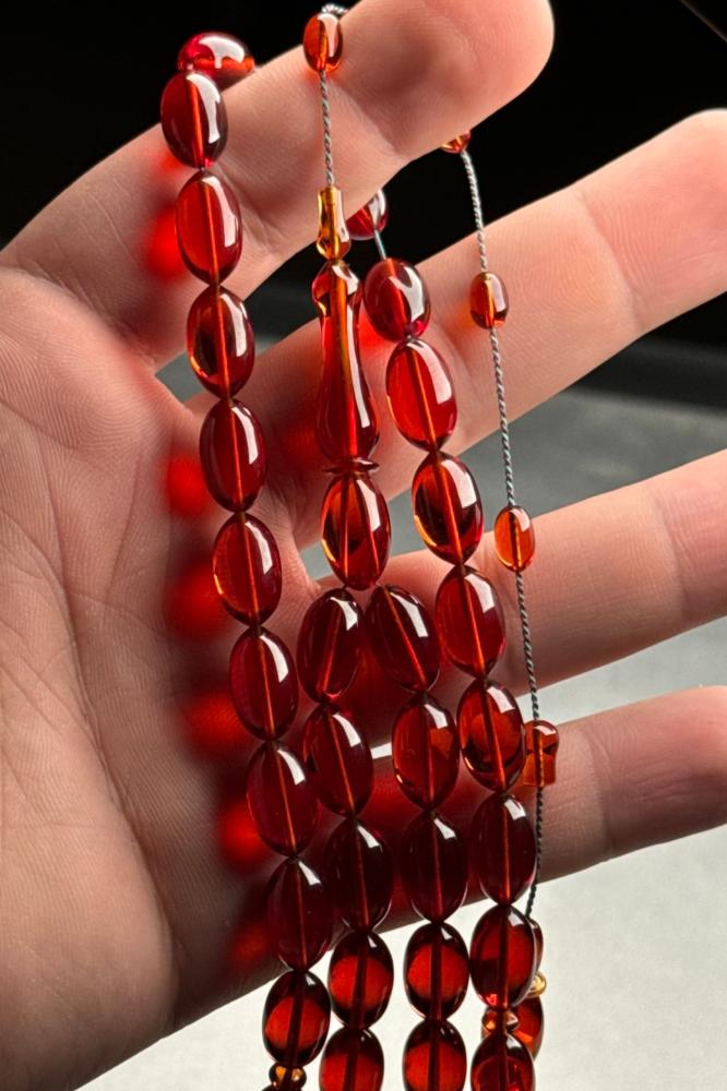 Honey-colored prayer beads from old Sabb sticks