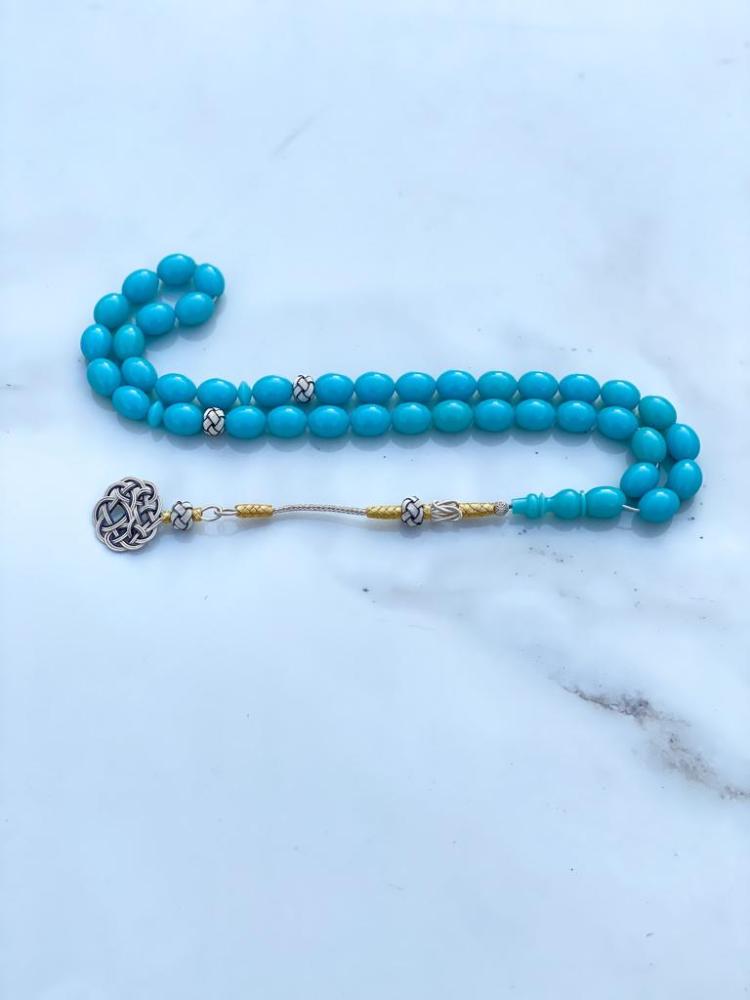 A prayer bead with beads