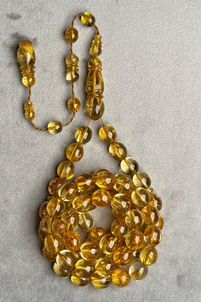 Transparent rosary with gold plating from old cast sticks