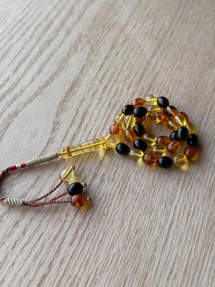 Natural amber prayer beads, sorted