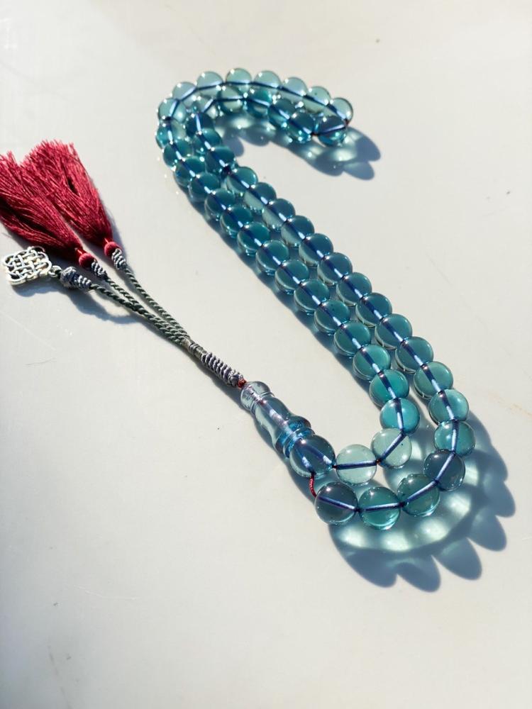 A prayer bead with a clasp