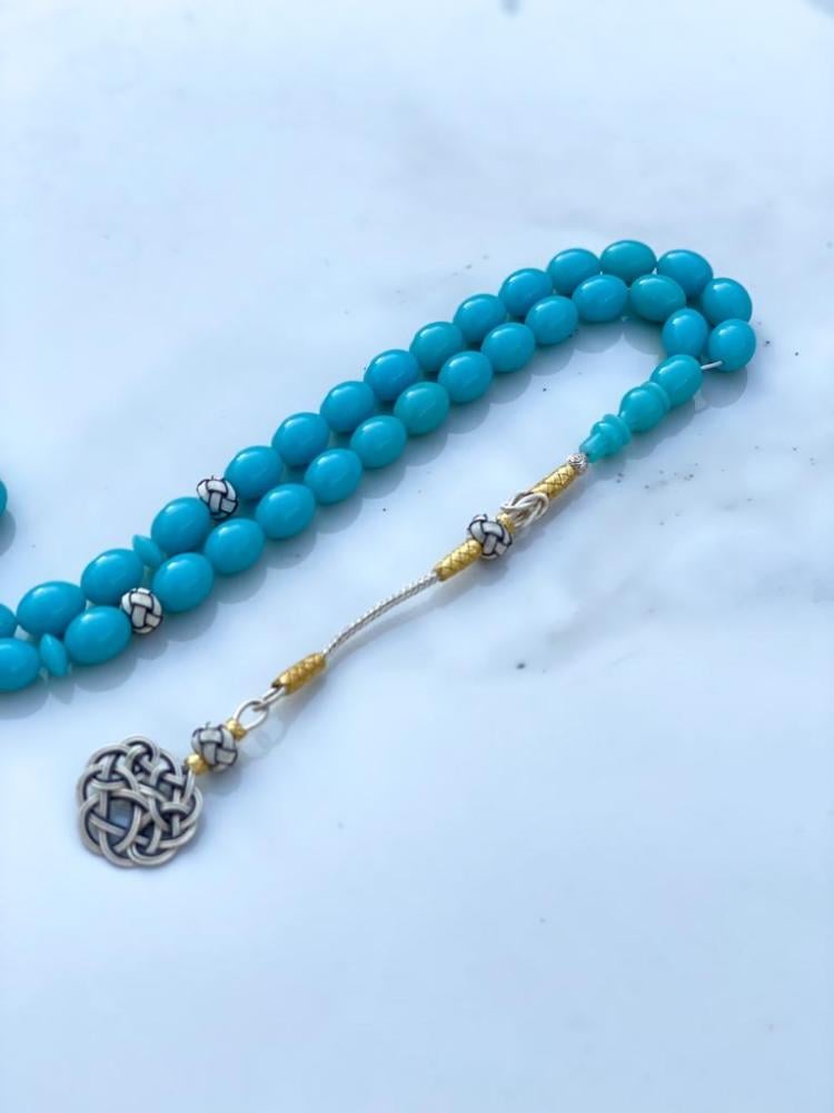 A prayer bead with beads
