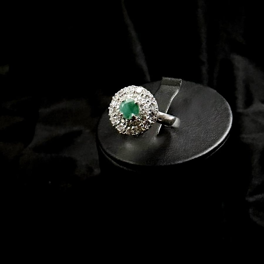 Natural African emerald accented with zircon.. 925 silver.. size (US 9)