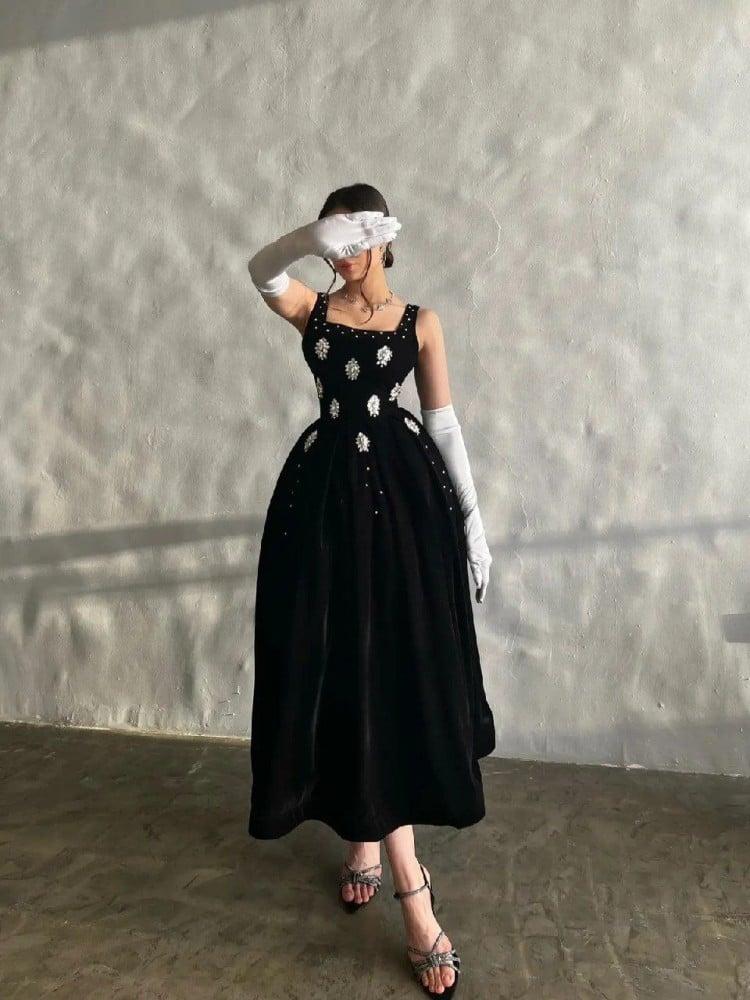 Black velvet dress with white embroidered sleeves