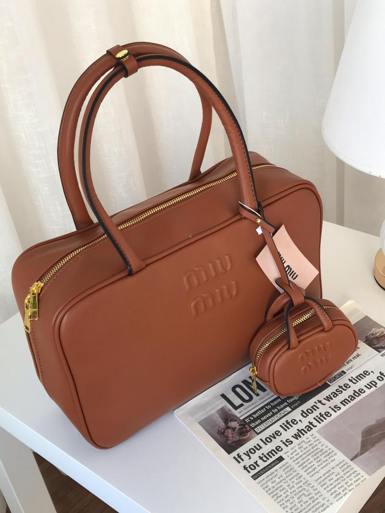 Miumiu bags with the comment, decorative