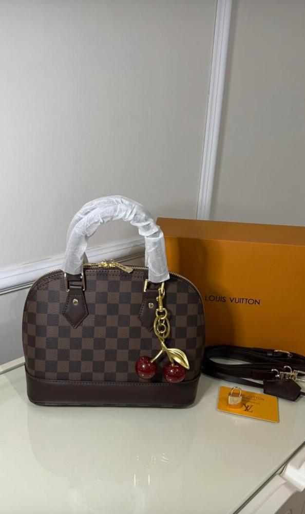 Louis Vuitton bag with the medal