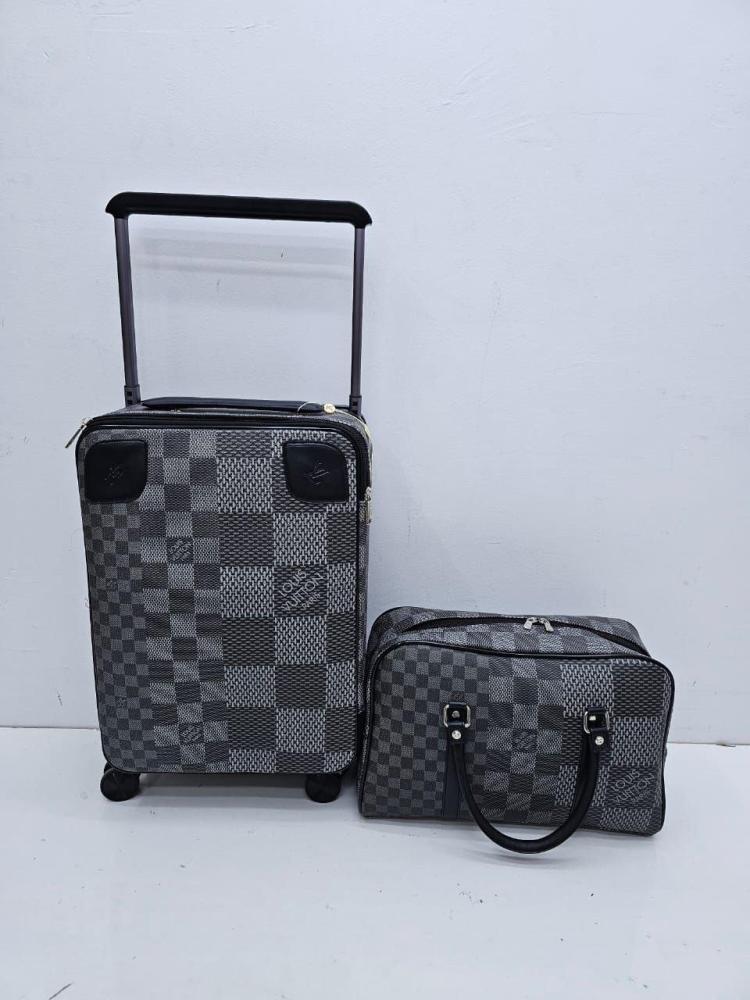 Louis Vuitton travel bag with hand bag