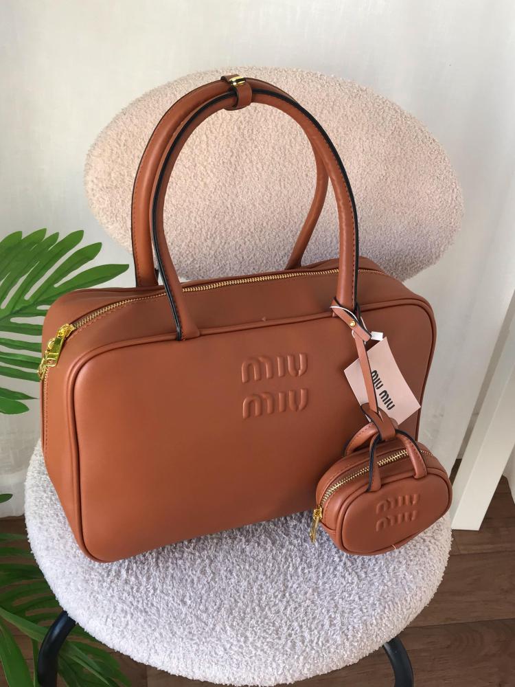 Miumiu bags with the comment, decorative
