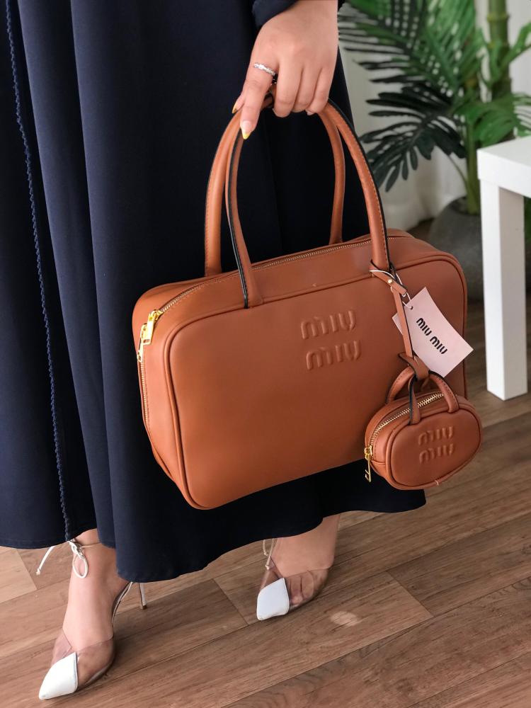 Miumiu bags with the comment, decorative