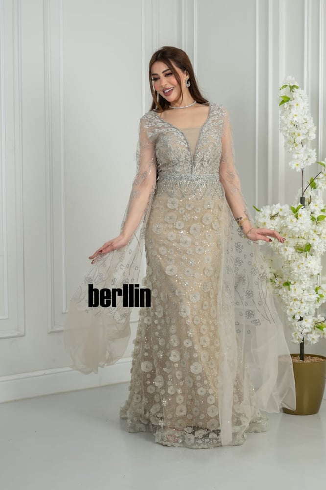 Beige maxi evening dress with embroidered cape sleeves
