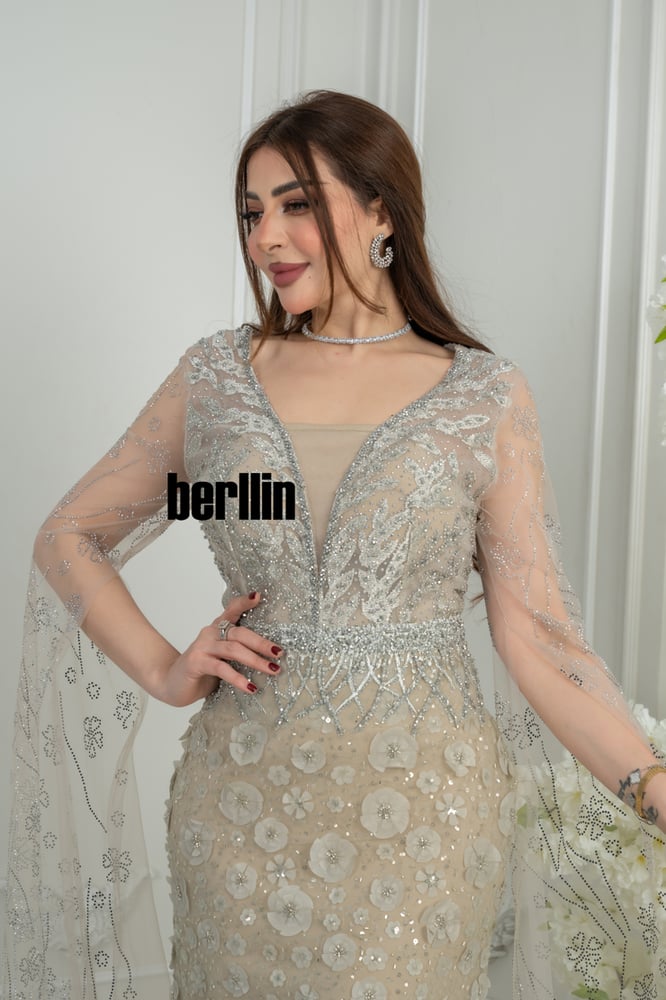 Beige maxi evening dress with embroidered cape sleeves