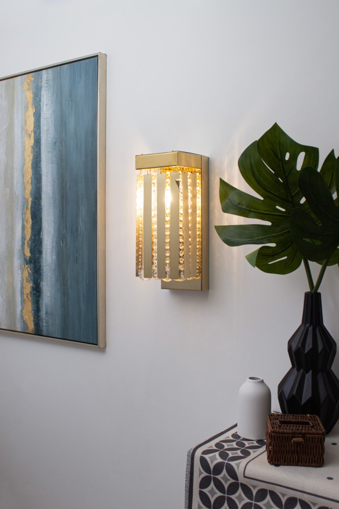 Modern wall panel with crystal and steel comments, gold color