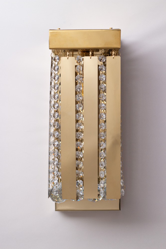 Modern wall panel with crystal and steel comments, gold color