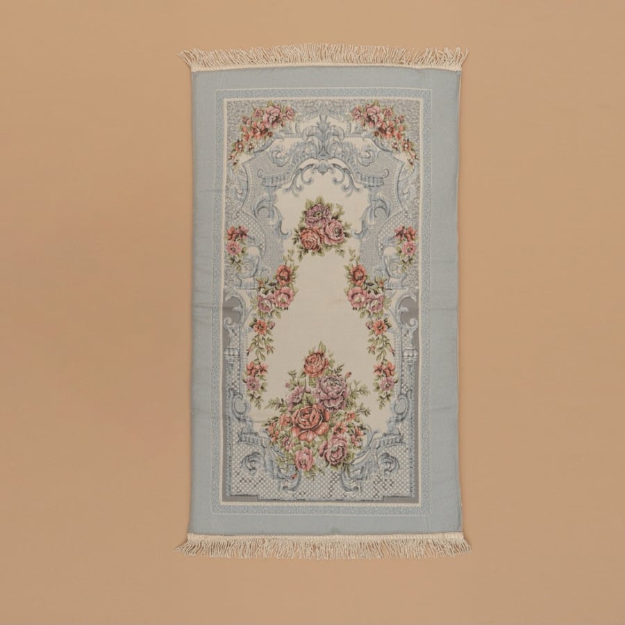 Cyan embroidered rug with foam