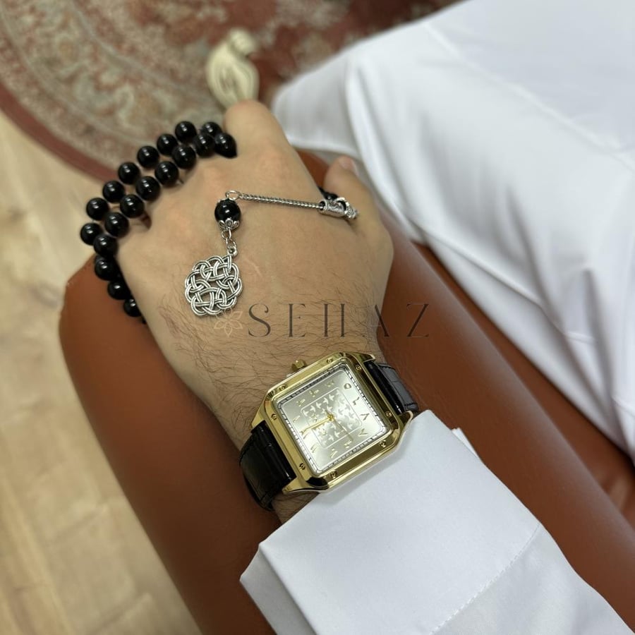 ساعة رجالي استيك جلد اسود اطار مربع لون ذهبي مينا ابيض