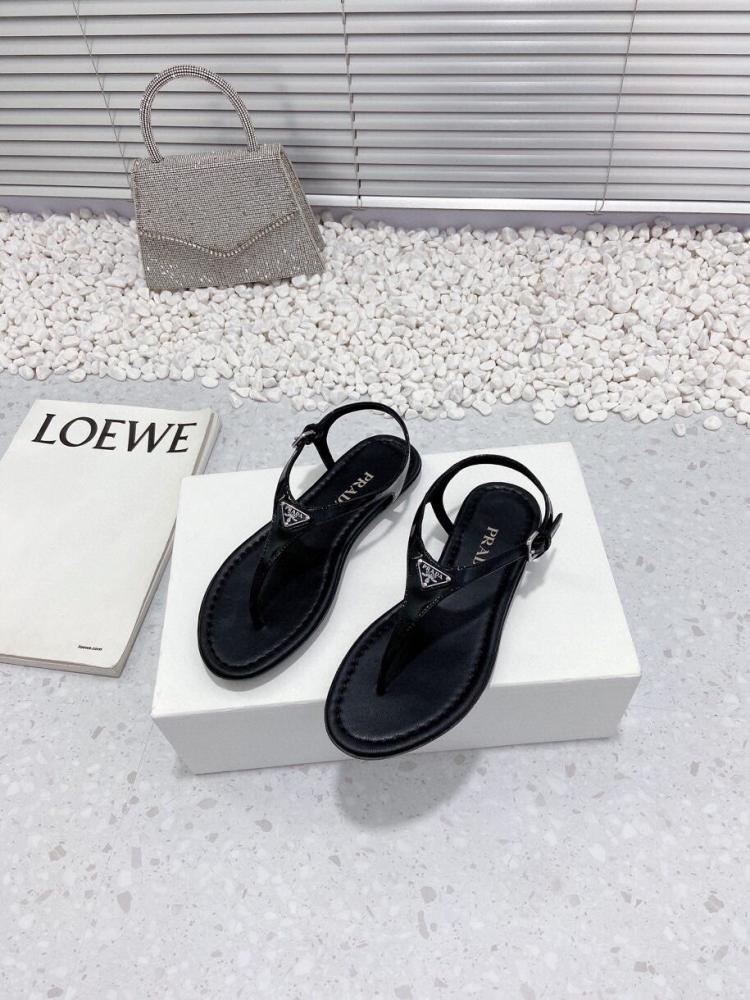 Sandals and slippers Prada