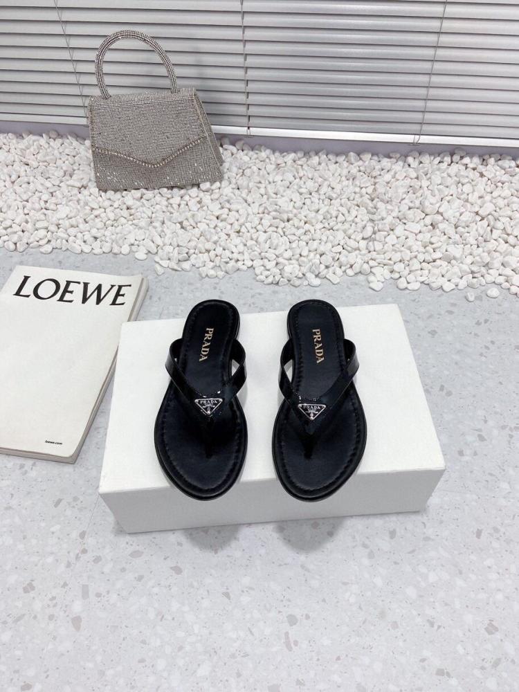 Sandals and slippers Prada